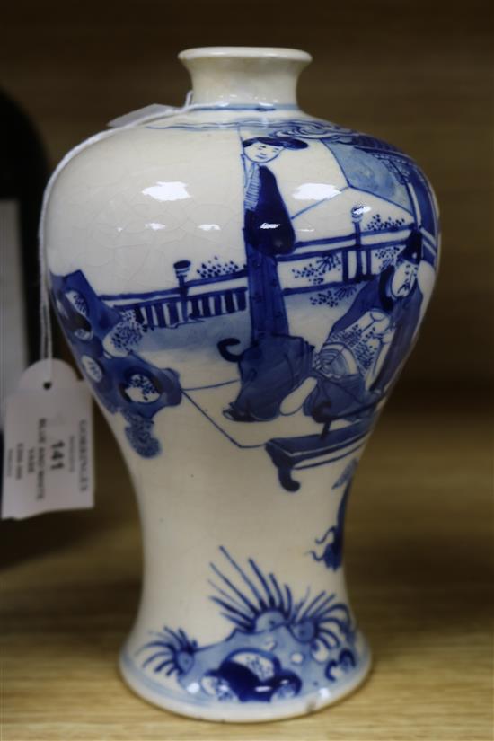 A Chinese softpaste porcelain blue and white Meiping, 18th/19th entury, wood stand Height 19.5cm